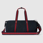 gucci-large-printed-canvas-duffle-bag.jpg
