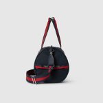 gucci-large-printed-canvas-duffle-bag.jpg