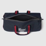 gucci-large-printed-canvas-duffle-bag.jpg